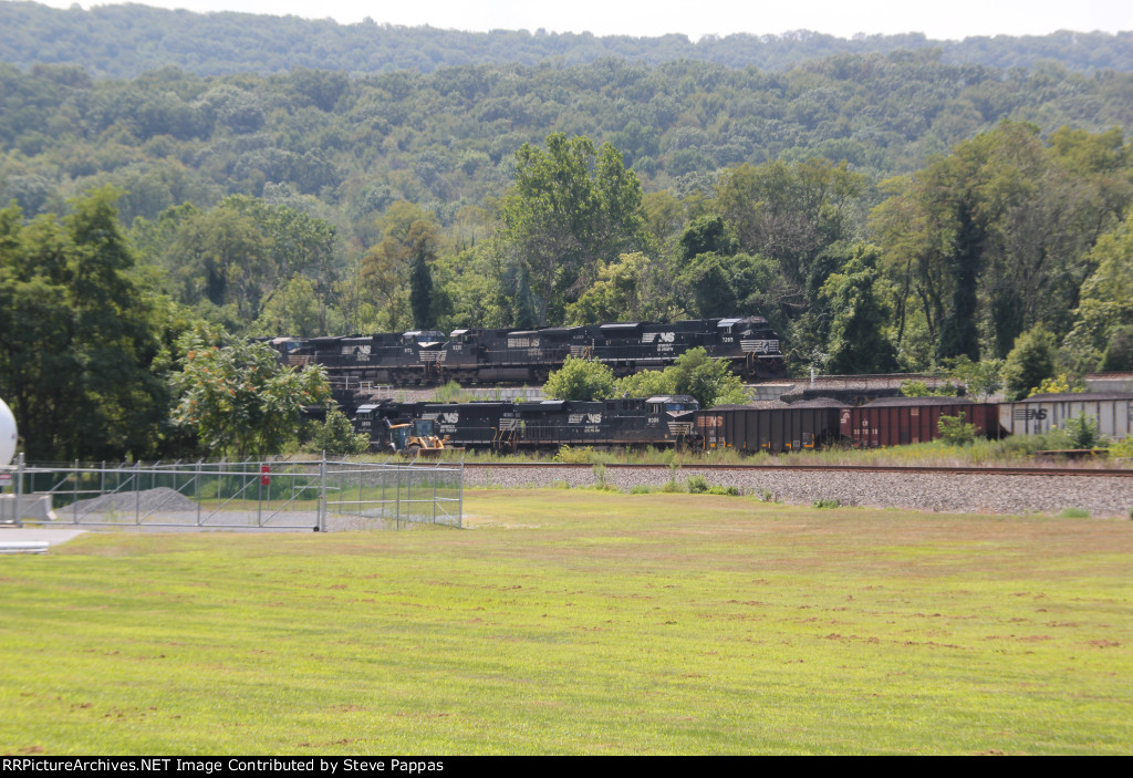 Train 35A passes on the high line through Marysville, while a coal drag is below on G track
